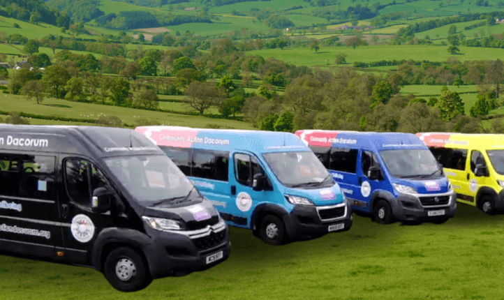 a row of newly coloured mini busses